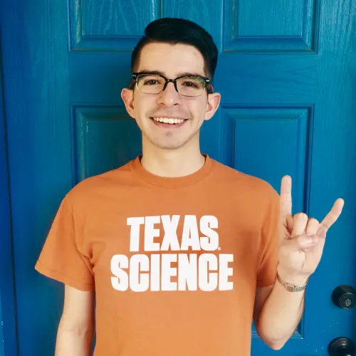 Photo of Daniel with Hook'em Horns Photo of Daniel with Hook'em Horns