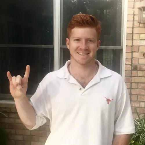 Photo of Gabe with Hook'em Horns Photo of Gabe with Hook'em Horns