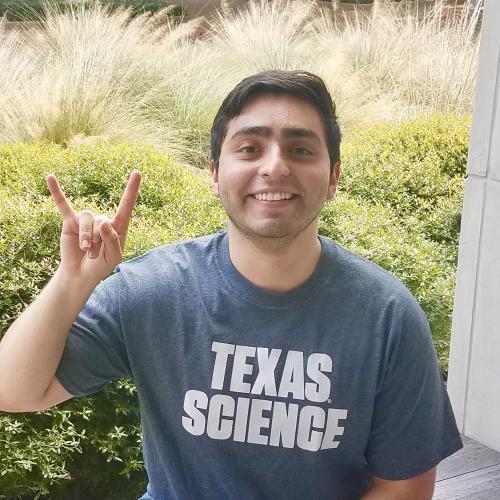 Photo of Gonzalo with Hook'em Horns