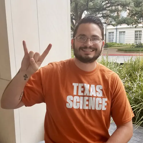 Photo of Kevin with Hook'em Horns Photo of Kevin with Hook'em Horns