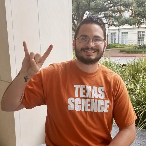 Photo of Kevin with Hook'em Horns Photo of Kevin with Hook'em Horns