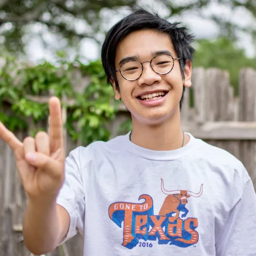 Photo of Lambert with Hook'em Horns Photo of Lambert with Hook'em Horns